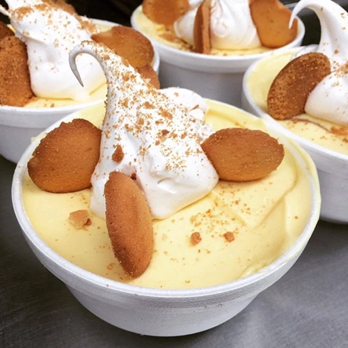Small cropped view of Banana pudding in cups.